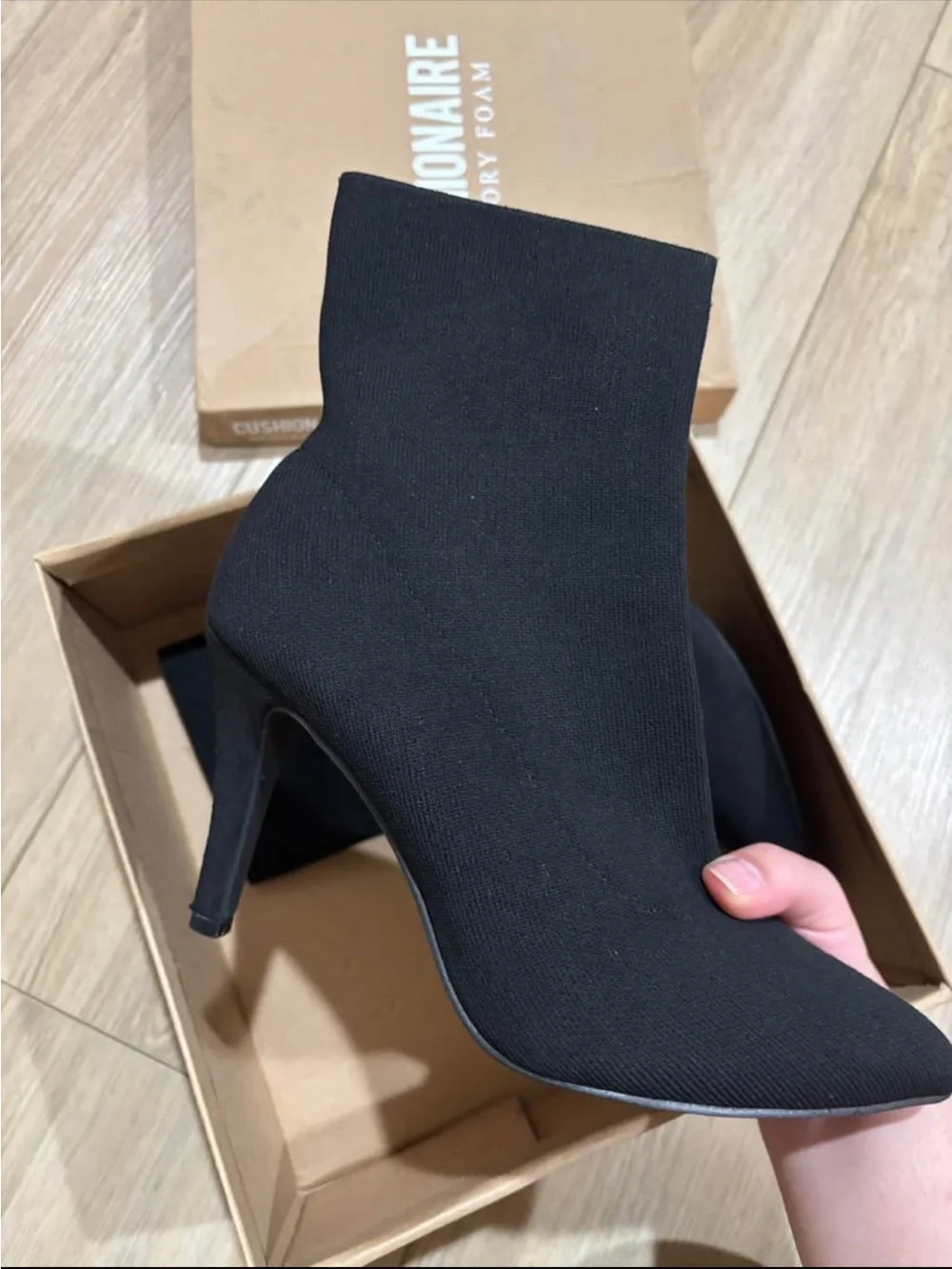 Black Stretch Knit Pointed-Toe Ankle Bootie